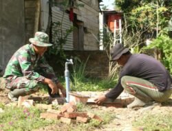 Satgas TMMD ke-123 Kodim 0104/Atim Rampungkan Pengecoran Lantai dan Pemasangan Kran Air.