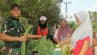 Potret Humanis TMMD di Alue Canang, Personel Satgas Jadi Sahabat Masyarakat Desa