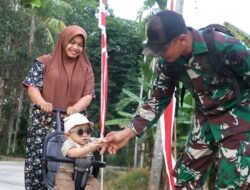 Di Balik Seragam Loreng, Ada Rindu Seorang Ayah yang Bertugas di TMMD