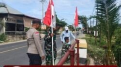 Polsek dan Koramil Peureulak Barat Perkuat Semangat Kebangsaan Lewat Pemasangan Bendera Merah Putih