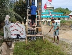 Pengabdian Penuh Makna, Keuchik Zuliadi, Ajak Perangkat Desa Wujudkan Gotong Royong, Menghiasi Pintu Gerbang Masuk.