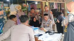 Kapolsek Nurussalam Bantu Warga Daftar Perlindungan Sosial di Darul Falah